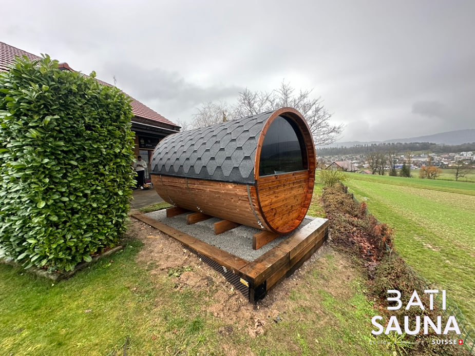 Installation sauna tonneau sur un béton maigre