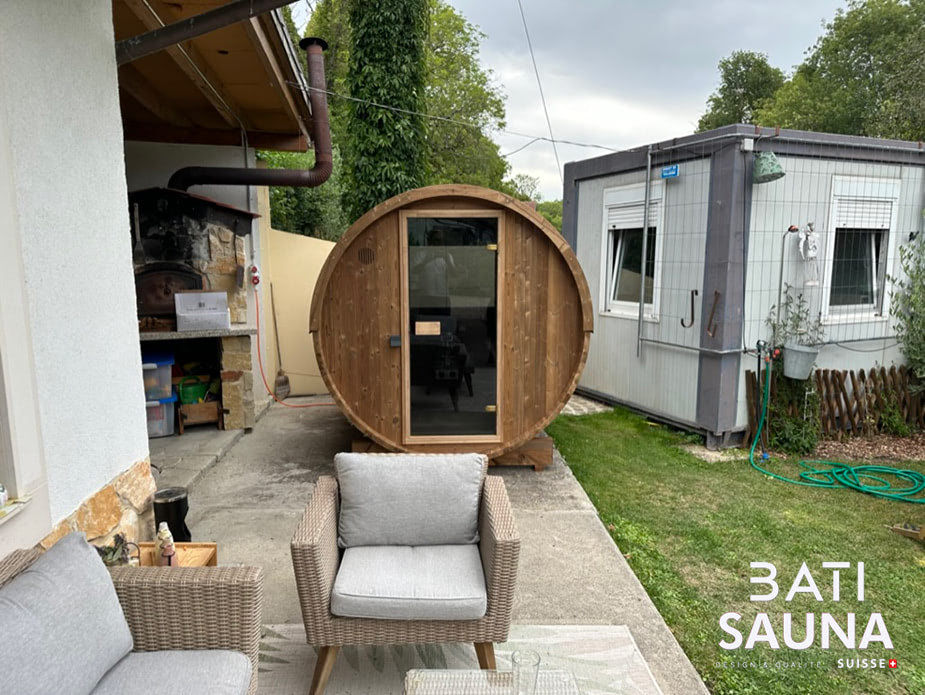 Sauna tonneau sur une dalle de béton